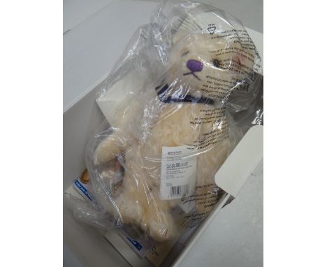 A boxed limited edition Steiff Diamond Jubilee commemorative bear set with a genuine solitaire diamond