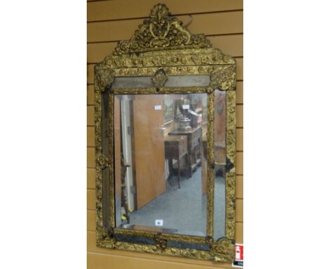 Antique gilt metal framed bevel plated hanging wall mirror having central rectangular mirror plate with further mirror border