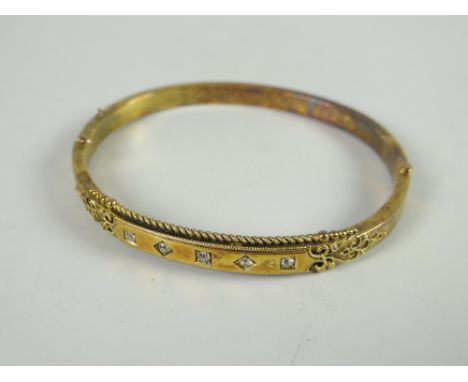 15ct gold five-stone diamond chip bangle, 9.8grams approx. Condition reports provided on request by email for this auction ot