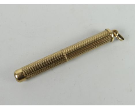Small 9ct gold engine turned propelling tooth pick, 5.9grams approx. Condition reports provided on request by email for this 