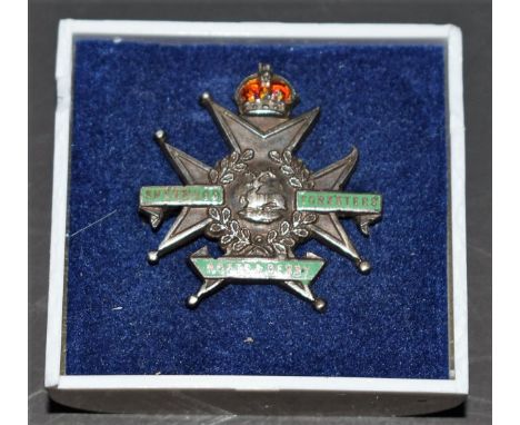 A Sherwood Foresters, Notts and Derby Sterling silver and enamel badge