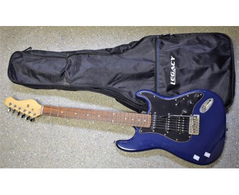 An electric guitar, soft carry case