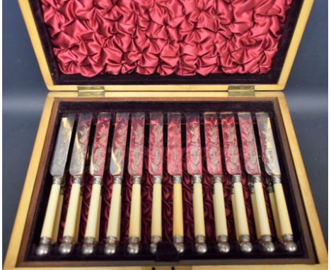A 19th century EPNS ball ended twelve setting dessert knife and fork set, mahogany case 