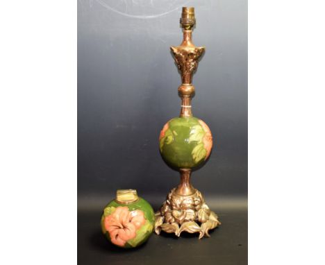 A Moorcroft gilt metal mounted Hibiscus pattern table lamp, cast with flowers, the column with Moorcroft globular knop tube l