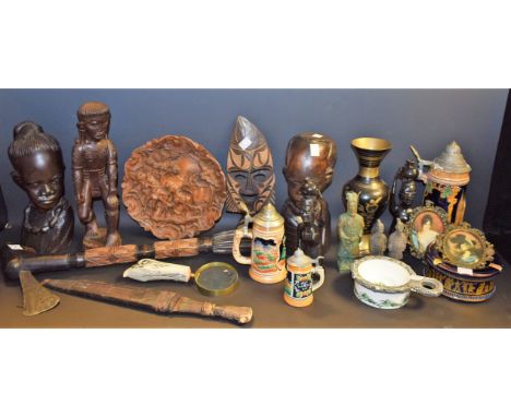 A pair of African hardwood carved busts; an African carved figure; an African dagger, leather scabbard; lidded beer stein; ot