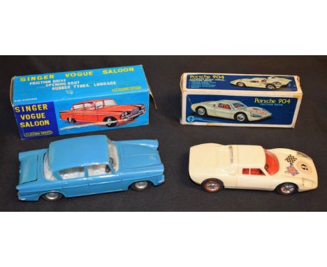 Clifford Series (Hong Kong) - a friction driven push and go Porsche 904 plastic racing car, white moulded body, red interior,