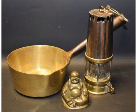 Mining - a steel and brass miners lamp, by Richard Johnson Clapham and Morris Ltd; a Chinese Buddha; a brass saucepan (3)