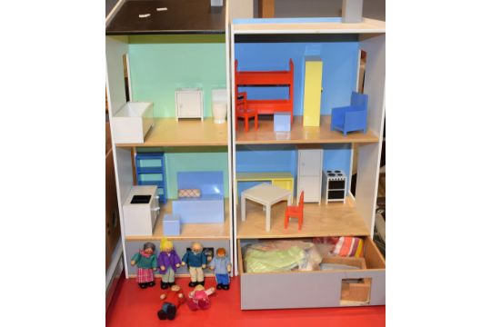 An Ikea two section dolls house with An Ikea two section dolls house with