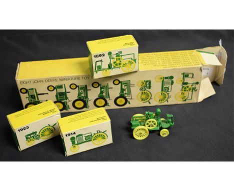 Agricultural Toys - an Ertl Toys John Deere miniature eight piece tractor set, boxed