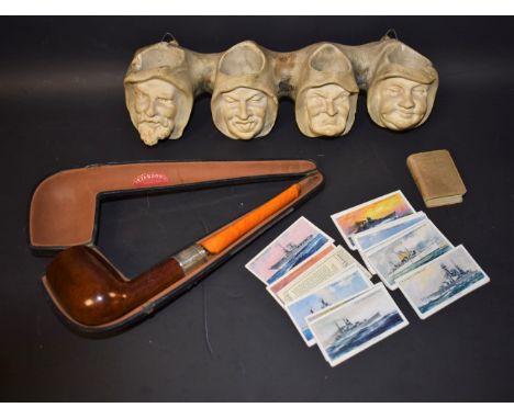 Boxes and Objects - four conjoined plaster grotesque heads, with hanging hooks, 27.5cm; smoking pipe, silver mounted, Peterso