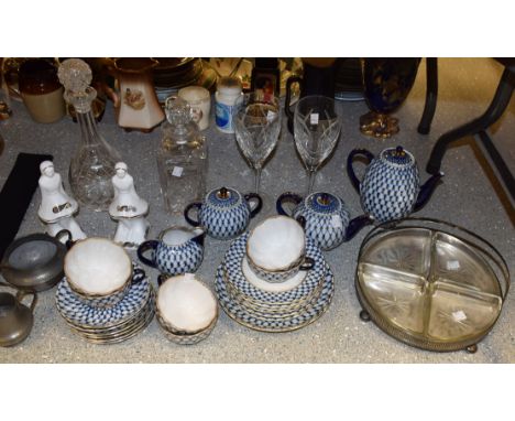 A Russian china tea service, for six, royal blue and gilt decoration on white ground, comprising cups, saucers, tea plates, b