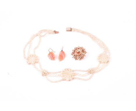 An Edwardian seed pearl necklace, suspended with shell-shaped mother-of-pearl pendants, strung with rows of seed pearls, yell