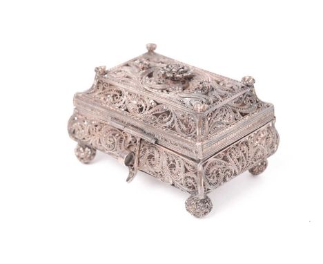 A late 19th-century Russian filigree silver table casket. Moscow 1879 possibly by Michael Andreyev. The rectangular body of b