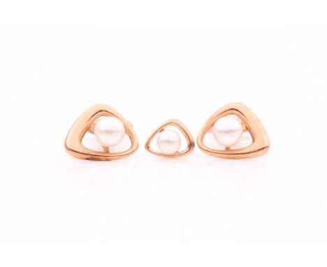 A pair of yellow metal and pearl cufflinks, the triangular shaped gold border inset with a cultured pearl, approximate length