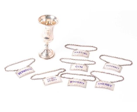 A set of seven silver and blue enamel decanter labels, mid-century (various dates) by Turner &amp; Simpson, each with chain, 