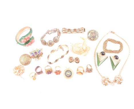 A group of costume jewellery items, to include a Trifari snake bangle, the two snake heads decorated with green enamel and co
