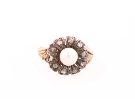 A cultured pearl and rose diamond cluster ring; with engraved tapering shoulders and partial closed back setting to pearl unm