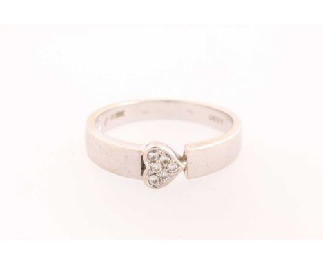 A heart-shaped diamond cluster ring. the pave set diamond cluster formed as a terminal to angled band. stamped '18k' Total di