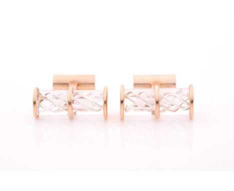 A pair of Steuben air-twist crystal glass cufflinks, the mounts marked 14K S, 2.3 cm long, boxed.