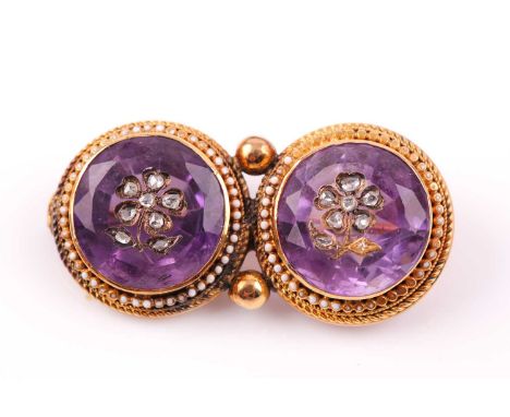 A Victorian yellow gold and amethyst double brooch, set with two round-cut amethysts, each inset with a daisy motif inset wit