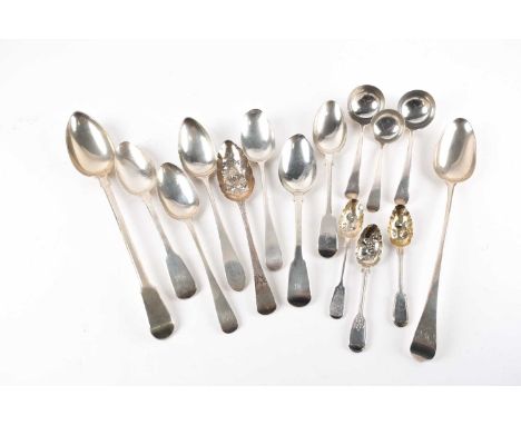 A silver fiddle pattern basting spoon with vacant handle, together with and old English pattern example engraved with a monog