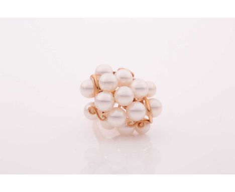 A yellow metal and pearl cluster ring, set with fifteen cultured pearls, unmarked, size L.