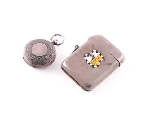 A silver and enamel vesta with enamelled crest to centre and monogram engraved to reverse, Birmingham 1911 and an engine turn