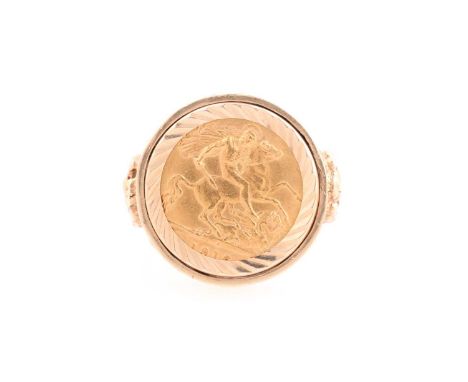 A George V half sovereign ring, set in 9 ct gold mount cast with helraldic shields to the shoulders on a textured ground, rin