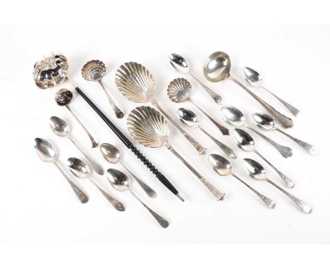 A pair of late Victorian silver serving spoons by James Wakely and Frank Clarke Wheeler with shell shaped bowls, London 1890,