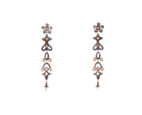 A pair of diamond and pearl drop pendant earrings, the floral cluster suspended with quatrefoil and trefoil segments inset wi