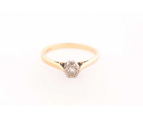 A single stone diamond ring, the round brilliant cut diamond in illusion mount to plain18ct gold shank. 2.95 grams Ring size 