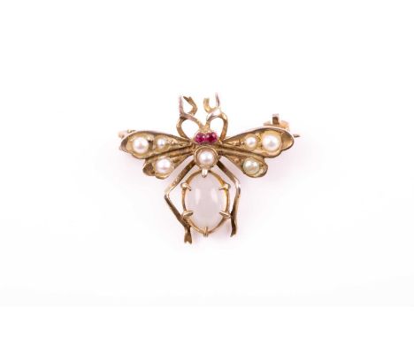 A gilt metal, moonstone, and pearl insect brooch, the wings set with pearls, small ruby eyes, and a moonstone set to the abdo