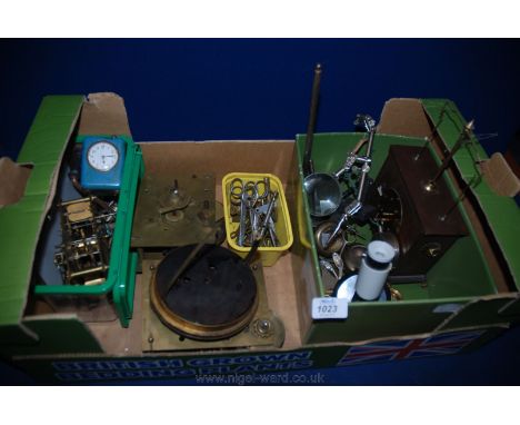 A quantity of spare parts for clocks, Clock maker's Tools, etc.