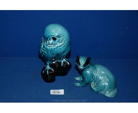 A Poole Pottery Owl and Badger.