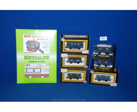 A quantity of Dapol and Graham Farish '00' gauge G.W. Wagons and a G.W.R Signal Box kit