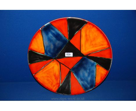 A Poole Pottery Studio charger in red abstract design, 16'' diameter.