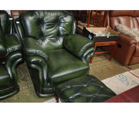 A modern green Leather upholstered Armchair with double sized button upholstered Footstool