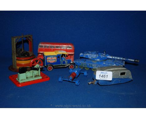 A Dinky Chieftain Tank, Dinky caravan, small Mamod pulley wheel, Corgi route master bus, Car made out of spark plug, etc.