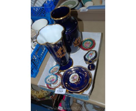 A quantity of Limoges trinket plates and dishes, two blue and gold Limoges vases