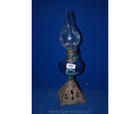 A blue glass and cast metal based Victorian Oil Lamp.