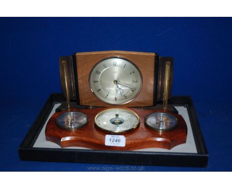 A Weather master Barometer along with a Motamic Mantle Clock