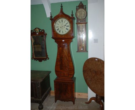 A late 18th c./early 19th c. Scottish Mahogany Longcase Clock having three finial pointed hood with slender turned column sup