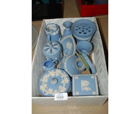 A quantity of Wedgwood Jasperware including vases, jugs, trinket pots and trays, a pair of dumpy candlesticks, etc.