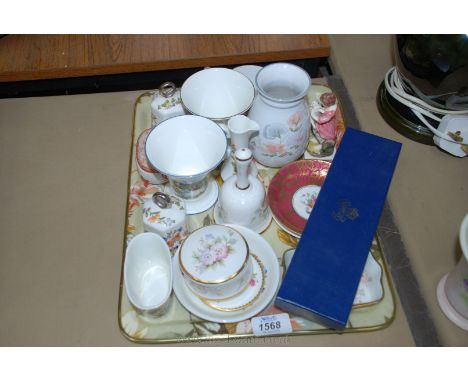 A quantity of china including an Aynsley boxed cheese knife, bells, trinket dishes, Wedgwood small vases, a Denby Vase etc.,
