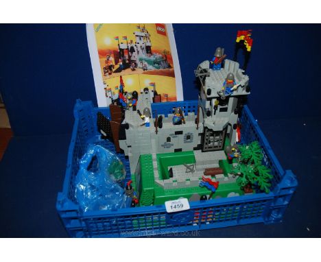 A Lego King Mountain Fortress and instruction leaflet.