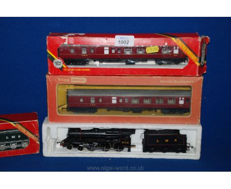 A Hornby '00' gauge L.M.S class 5P5F locomotive and tender, L.M.S Brake first coach and a Triang Hornby L.M.S Brake first coa