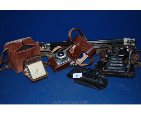 A quantity of Cameras including a Bellows camera by Houghton Butcher, Ideal and Agfa, together with a tripod in canvas carryi