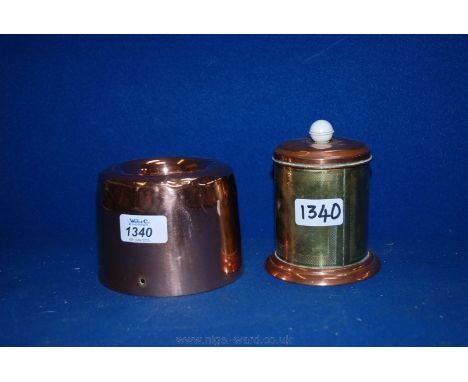 A copper Jelly Mould and a copper and brass Tea Caddy.