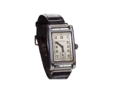 GENTLEMAN'S ETERNA FAB SUISSE STAINLESS STEEL MANUAL WIND WRIST WATCH,the rectangular cream dial with lume filled Arabic hour