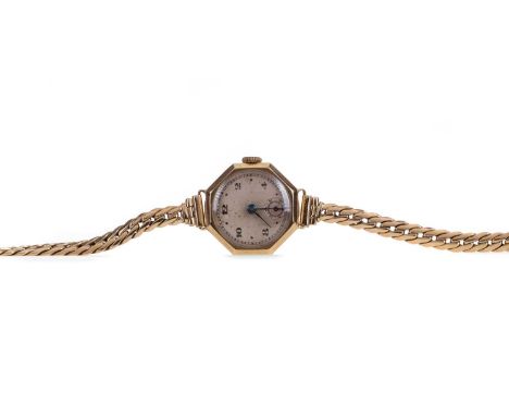 LADY'S BUREN NINE CARAT GOLD MANUAL WIND WRIST WATCH,the round cream dial with dot and Arabic hour markers, outer railroad se